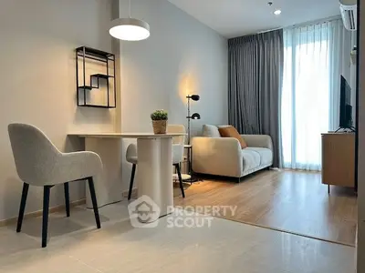 Modern living room with stylish furniture and natural light