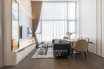 Modern living room with high ceilings and elegant decor