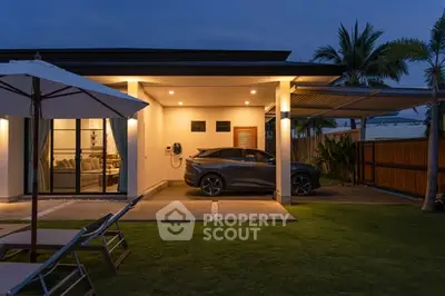 Modern single-story home with carport and lush garden, featuring evening ambiance and sleek architecture.