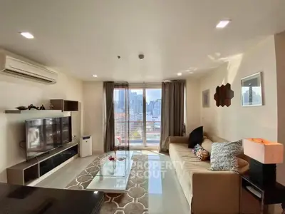 Spacious modern living room with city view and elegant decor