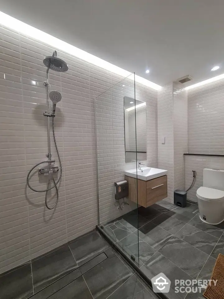 Modern bathroom with sleek shower and contemporary fixtures