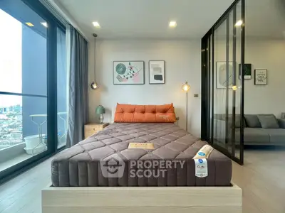 Modern bedroom with city view and stylish decor