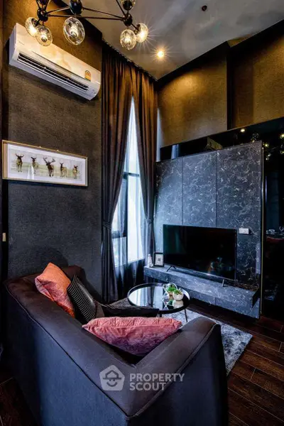 Luxurious living room with modern decor, high ceilings, and elegant lighting in a stylish apartment.
