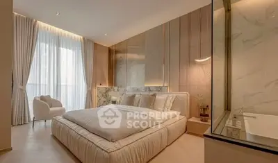 Luxurious modern bedroom with elegant decor and large windows for natural light.