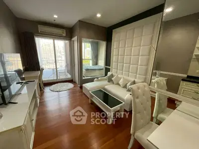 Modern living room with elegant white furniture and city view balcony