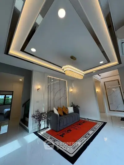 Luxurious modern living room with elegant chandelier and stylish decor