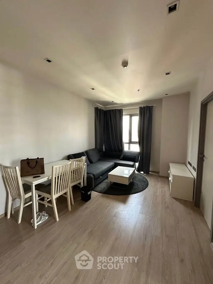 Modern living room with sleek furniture and natural light