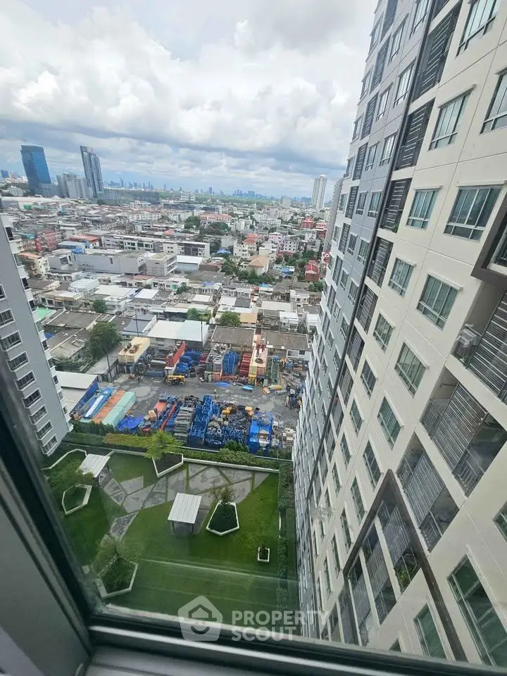 High-rise building view showcasing urban landscape and city skyline.