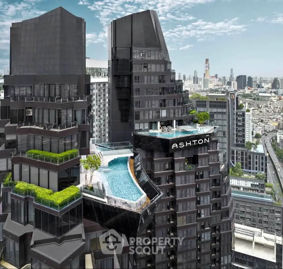 Luxurious high-rise building with stunning rooftop pool and city view