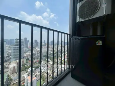 Stunning high-rise balcony view with cityscape and air conditioning unit.