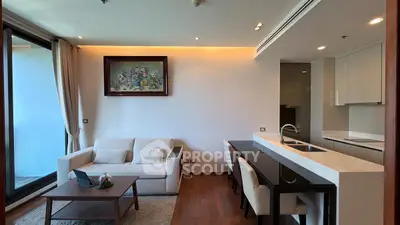 Modern living room with open kitchen and elegant decor