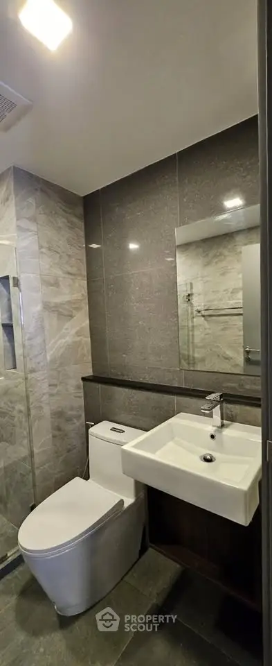 Modern bathroom with sleek fixtures and elegant tile design