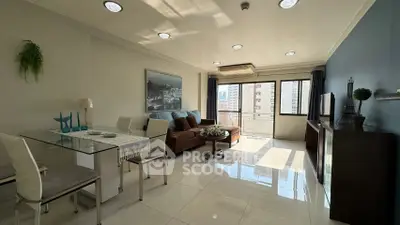 Spacious living room with modern decor and city view, perfect for urban living.