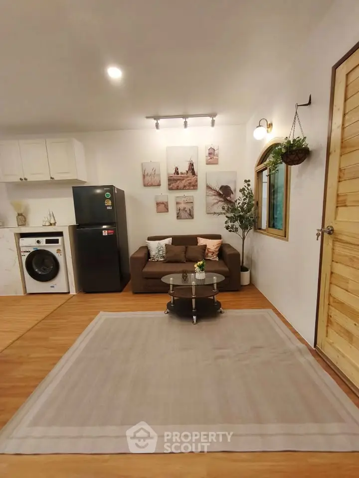 Cozy living room with modern appliances and stylish decor