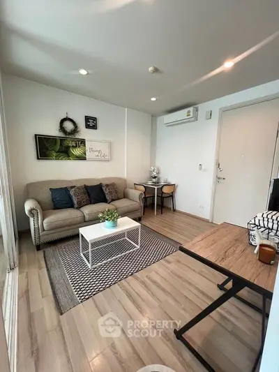 Modern living room with cozy sofa and stylish decor in a bright apartment