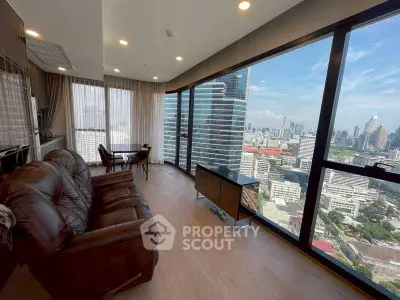 Luxurious living room with stunning city view and modern furnishings.