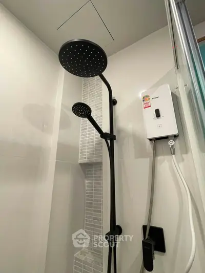 Modern bathroom shower with dual showerheads and water heater in sleek design.