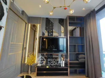 Luxurious modern living room with stylish decor and large TV