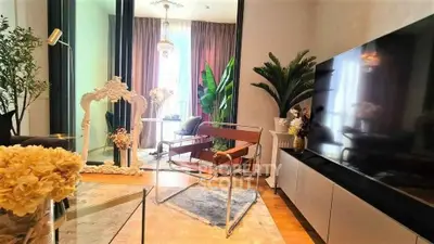 Stylish living room with modern decor and large TV