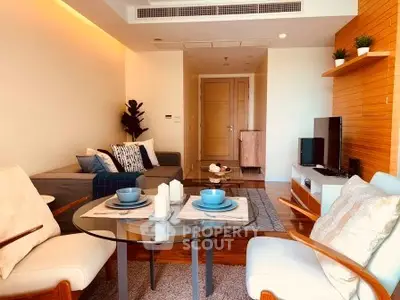 Modern living room with stylish decor and cozy seating area, perfect for relaxation and entertainment.