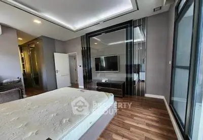 Luxurious modern bedroom with sleek design and large windows