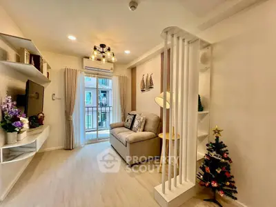 Cozy living room with modern decor and small balcony access