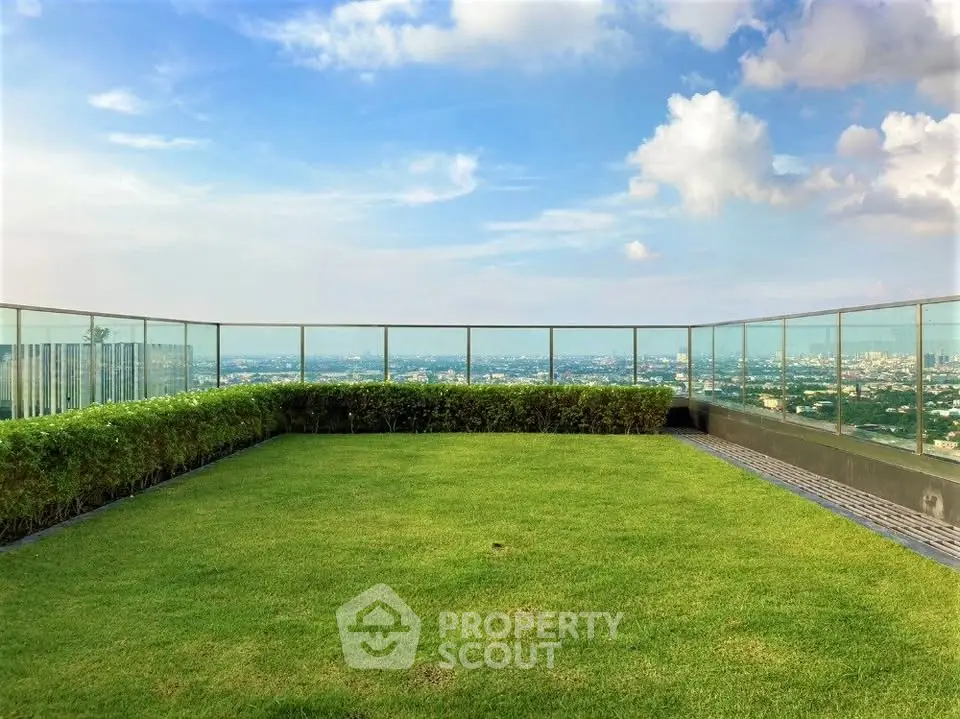 Stunning rooftop garden with panoramic city views and lush greenery.