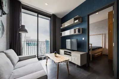 Modern living room with balcony view in stylish urban apartment