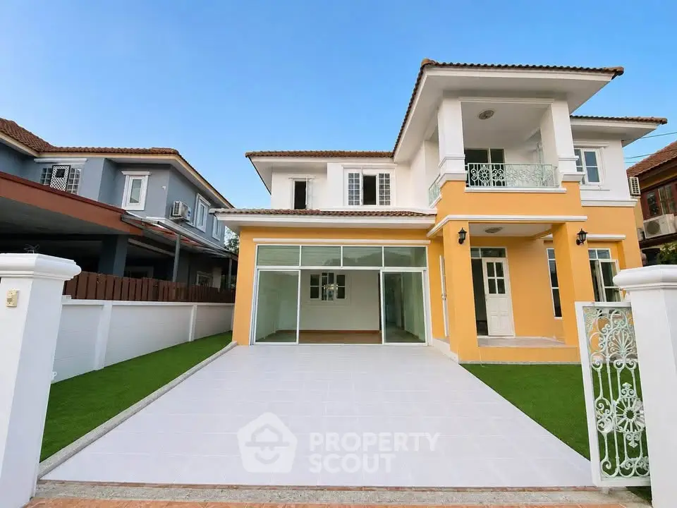 Stunning two-story house with spacious driveway and modern architecture in a serene neighborhood.
