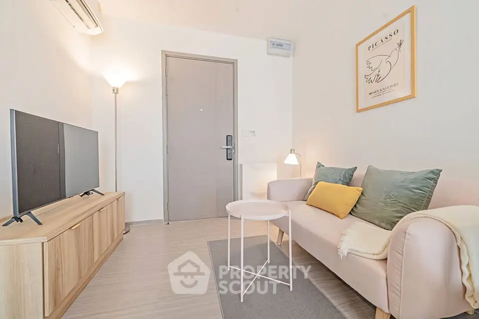 Chic modern living room with stylish decor and cozy seating, perfect for relaxation and entertainment.