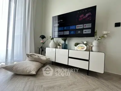 Modern living room with sleek TV setup and stylish decor