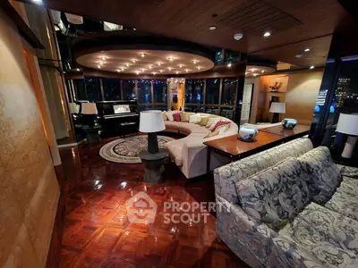 Luxurious living room with elegant decor and stunning city views, featuring plush seating and exquisite lighting.