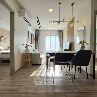Modern living room with stylish dining area and natural light