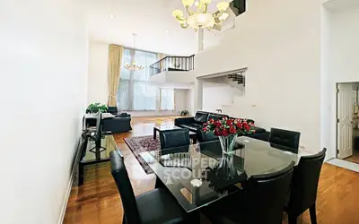Spacious luxury living room with high ceilings and elegant decor