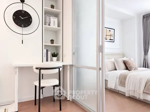 Modern bedroom with sliding glass door and stylish decor