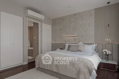 Luxurious bedroom with elegant decor and ensuite bathroom
