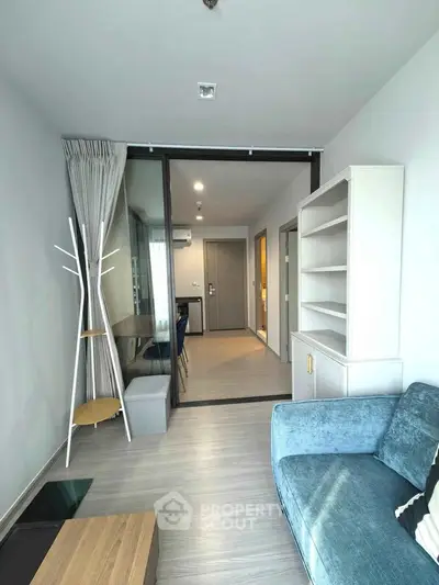 Modern living room with stylish furniture and open layout in a contemporary apartment.