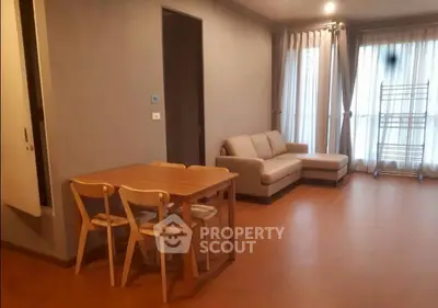 Spacious living room with modern furniture and natural light