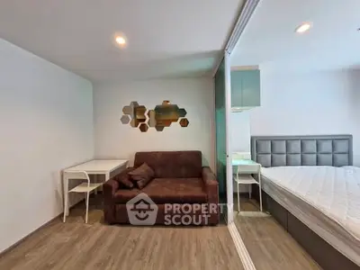 Modern studio apartment with cozy sofa and stylish decor