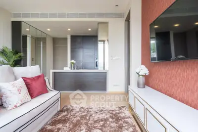 Modern living room with sleek design and open kitchen layout