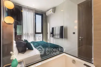 Modern bedroom with glass wall and city view, featuring stylish decor and natural light.
