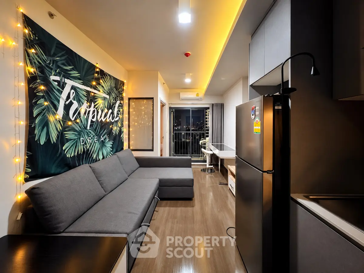 Modern living room with tropical decor and city view balcony