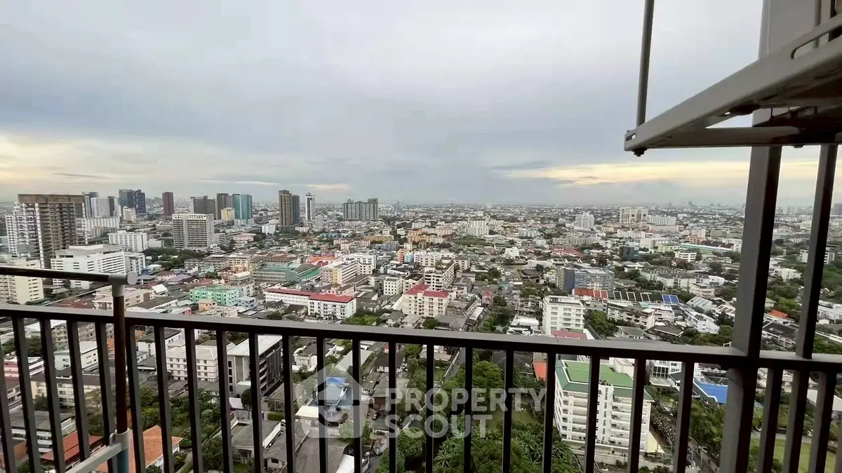 Stunning cityscape view from high-rise balcony, perfect for urban living enthusiasts.