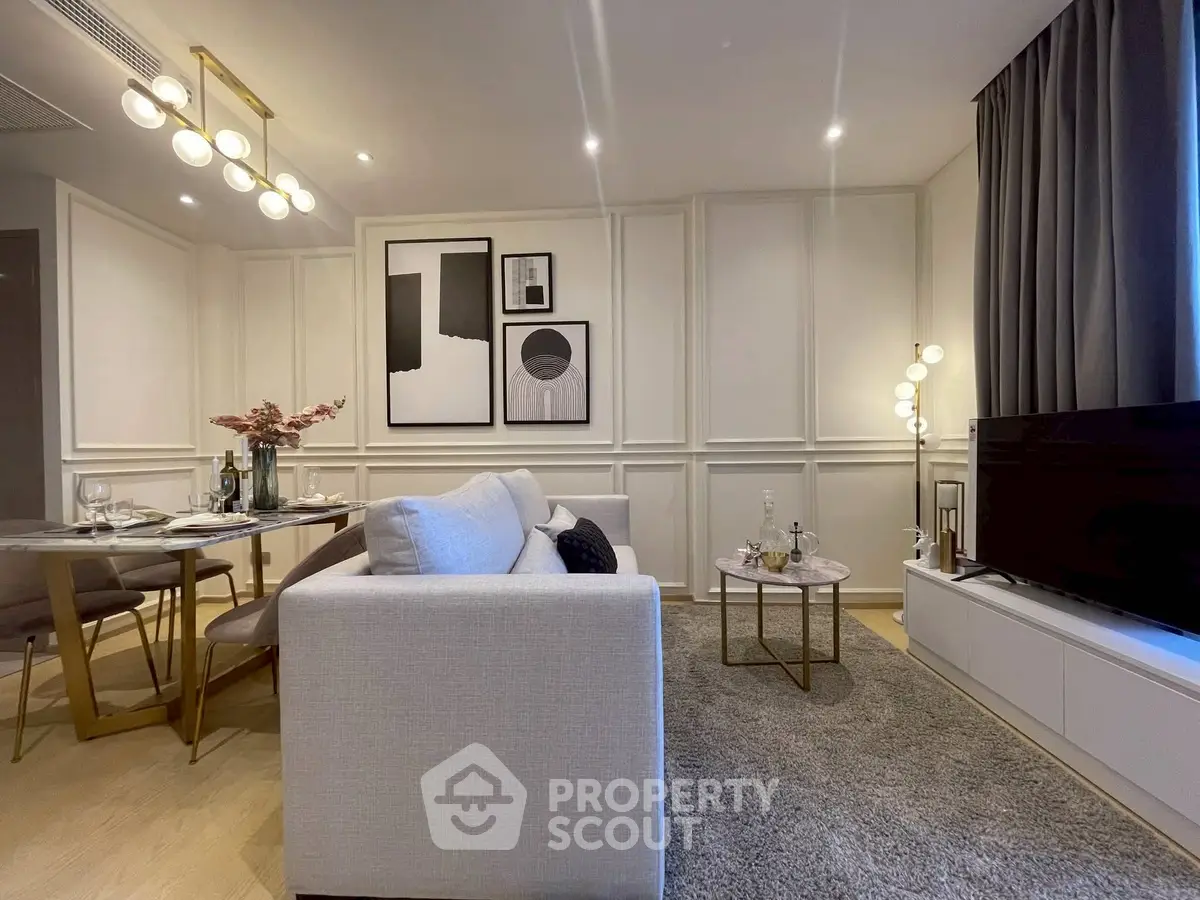 Elegant modern living room with stylish decor and dining area, perfect for urban living.