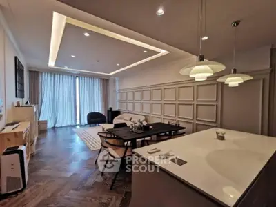 Spacious modern living room with elegant lighting and stylish furniture