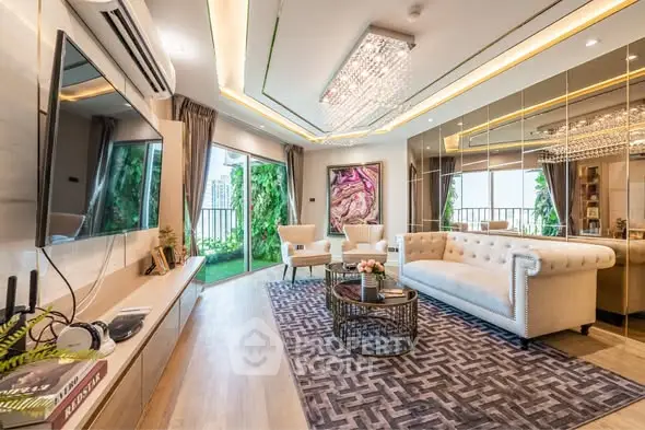 Luxurious living room with elegant decor and large windows opening to a balcony.
