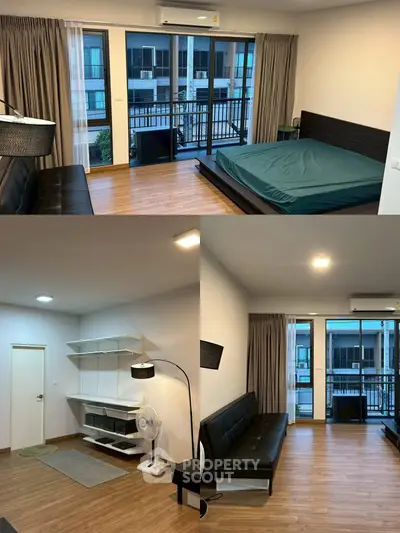 Modern apartment interior with balcony view, featuring sleek furniture and wooden flooring.