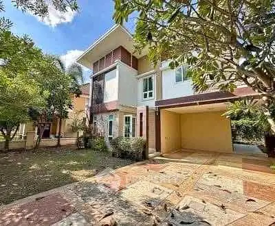 Charming two-story house with spacious garden and modern architecture.