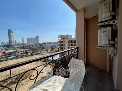 Charming balcony with city view, perfect for relaxation and enjoying urban scenery.