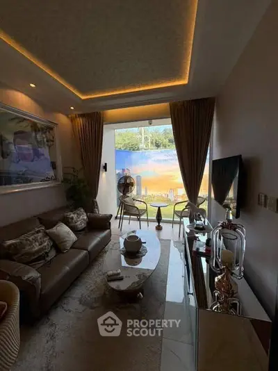 Luxurious living room with elegant decor and large window view